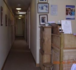 Corridor view with 2 cupboards ready to go into 2 treatment rooms